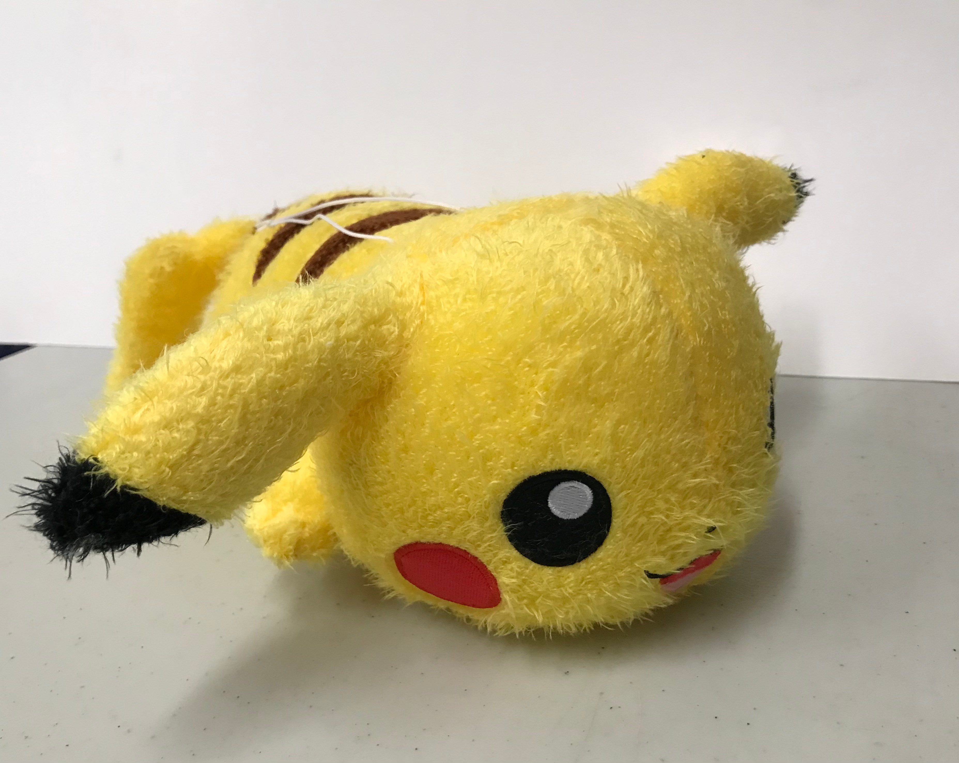 Image of Laying Pikachu (Fuzzy) Plush