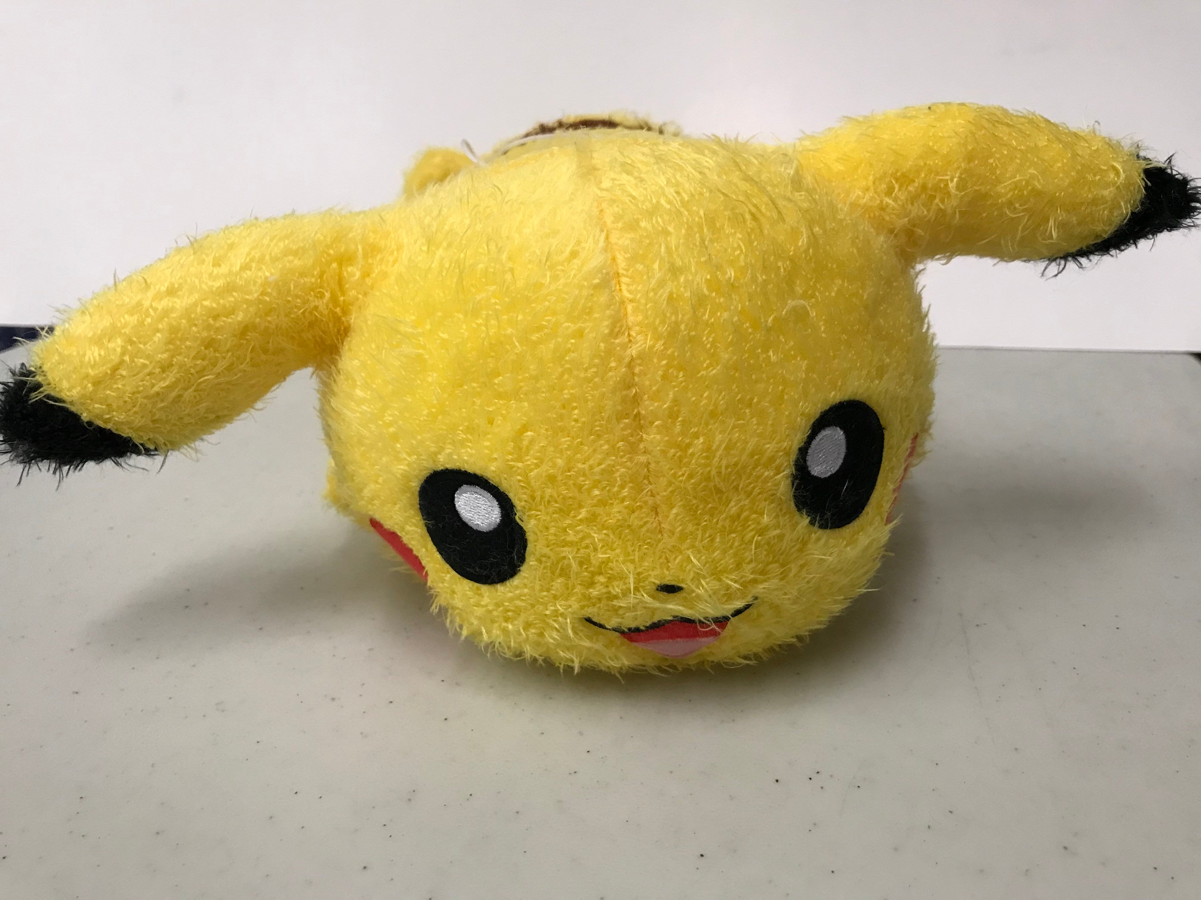 Image of Laying Pikachu (Fuzzy) Plush