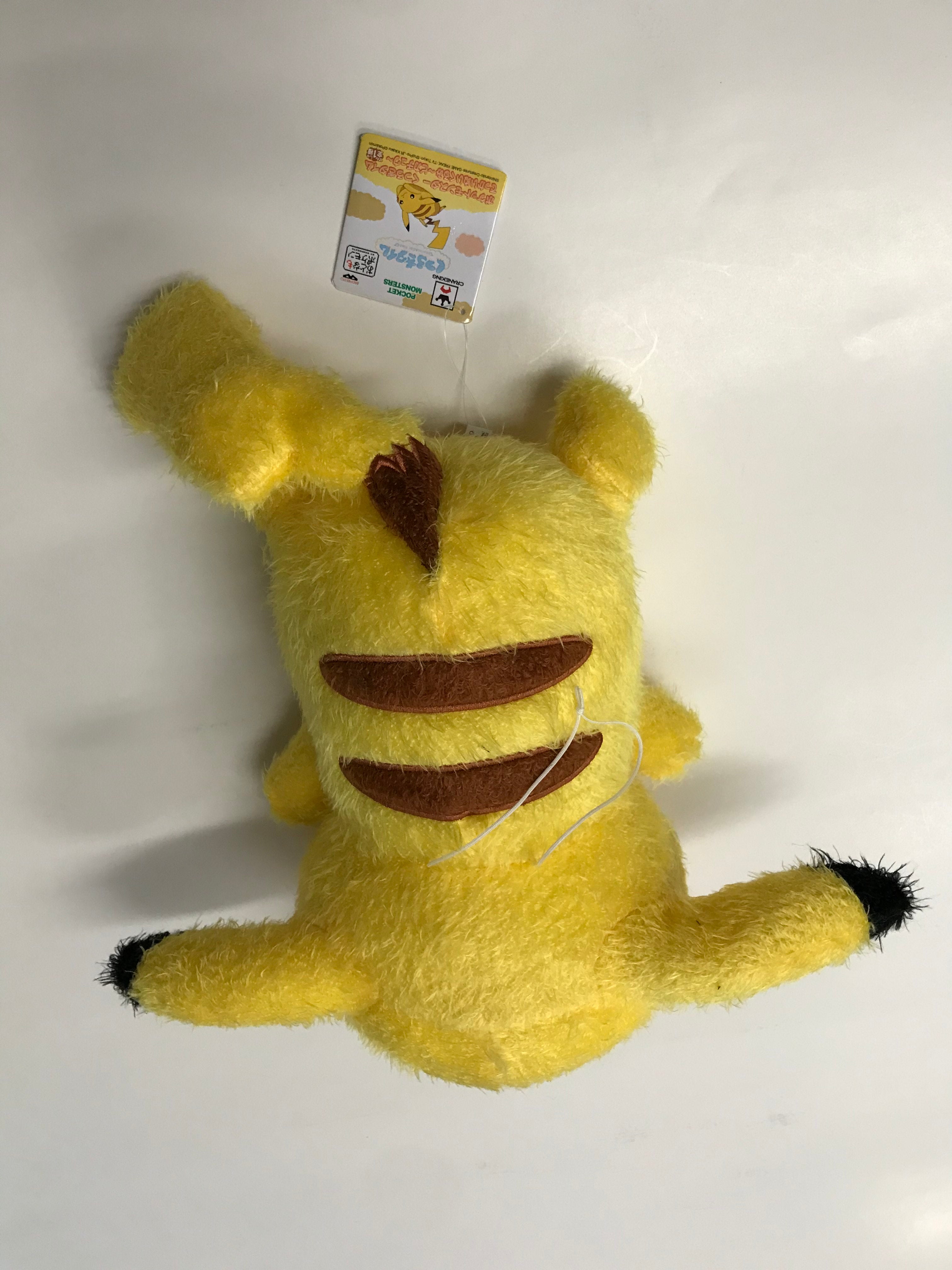 Image of Laying Pikachu (Fuzzy) Plush