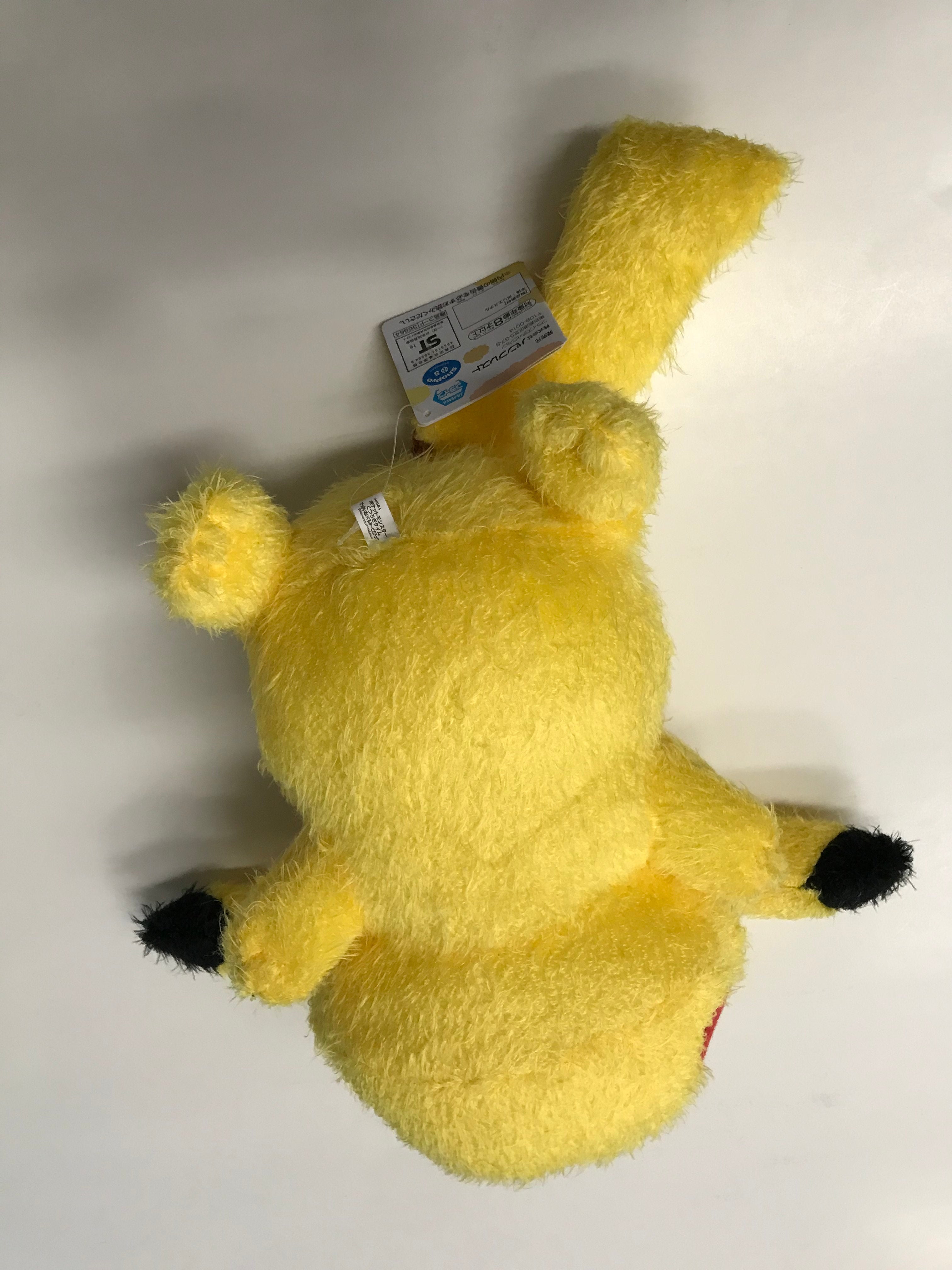 Image of Laying Pikachu (Fuzzy) Plush