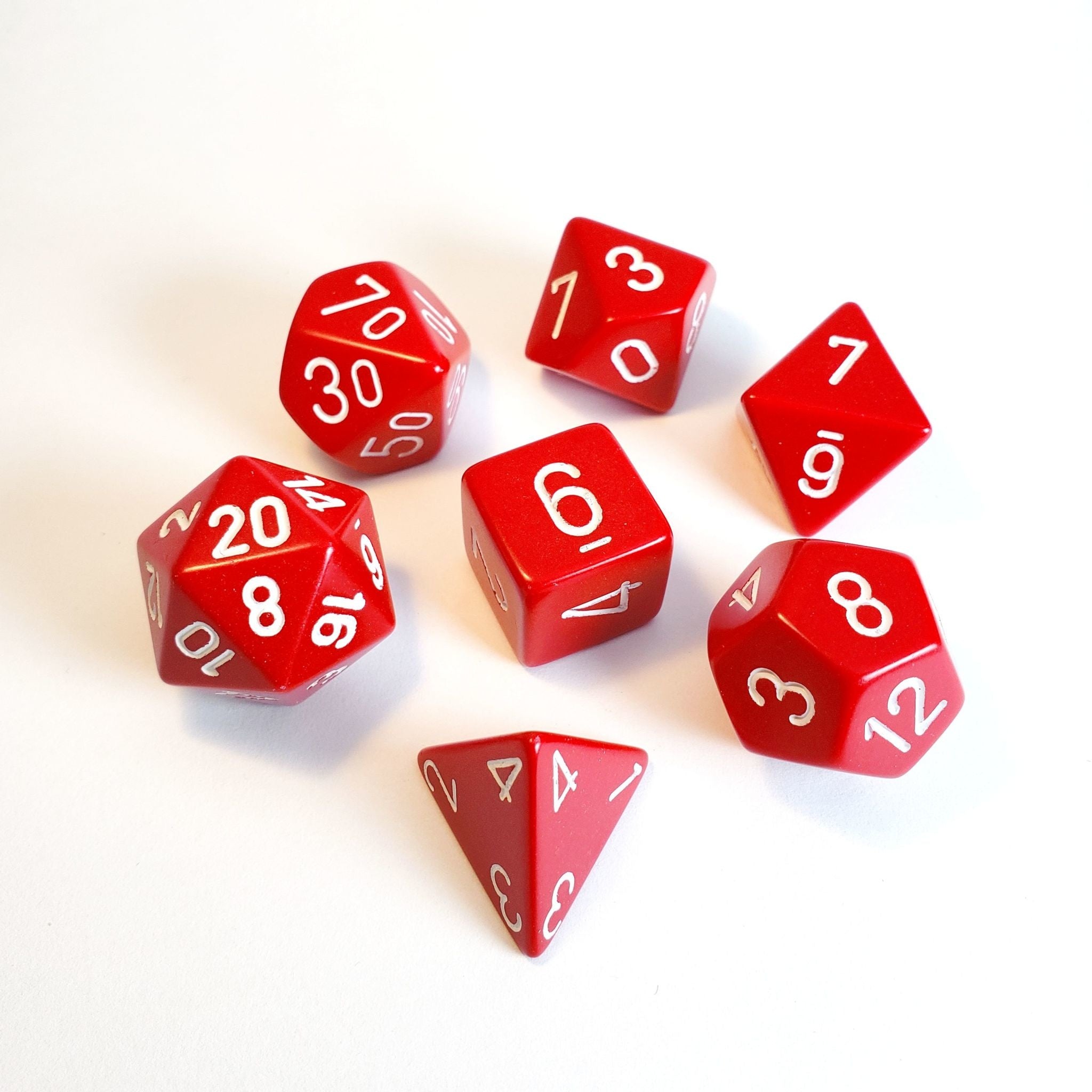 Image of Chessex Opaque - Red/White - 7 Dice Set